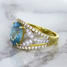 Load image into Gallery viewer, 5.29ct Oval Blue Zircon Ring with Diamond Accents in 18K Yellow Gold