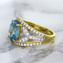Load image into Gallery viewer, 5.29ct Oval Blue Zircon Ring with Diamond Accents in 18K Yellow Gold