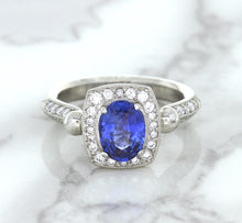 Load image into Gallery viewer, 1.56ct Oval Blue Sapphire Ring with Diamond Halo in Platinum