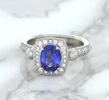 Load image into Gallery viewer, 1.56ct Oval Blue Sapphire Ring with Diamond Halo in Platinum