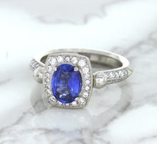 Load image into Gallery viewer, 1.56ct Oval Blue Sapphire Ring with Diamond Halo in Platinum
