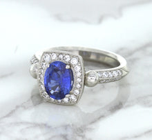 Load image into Gallery viewer, 1.56ct Oval Blue Sapphire Ring with Diamond Halo in Platinum