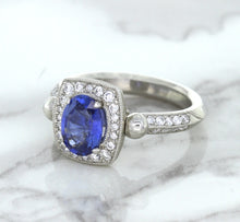 Load image into Gallery viewer, 1.56ct Oval Blue Sapphire Ring with Diamond Halo in Platinum