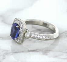 Load image into Gallery viewer, 1.56ct Oval Blue Sapphire Ring with Diamond Halo in Platinum