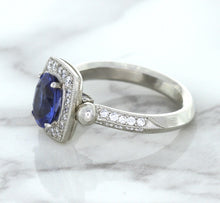 Load image into Gallery viewer, 1.56ct Oval Blue Sapphire Ring with Diamond Halo in Platinum
