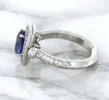 Load image into Gallery viewer, 1.56ct Oval Blue Sapphire Ring with Diamond Halo in Platinum