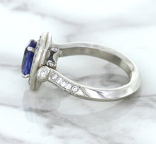 Load image into Gallery viewer, 1.56ct Oval Blue Sapphire Ring with Diamond Halo in Platinum