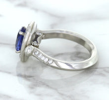Load image into Gallery viewer, 1.56ct Oval Blue Sapphire Ring with Diamond Halo in Platinum