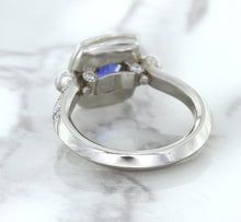 Load image into Gallery viewer, 1.56ct Oval Blue Sapphire Ring with Diamond Halo in Platinum