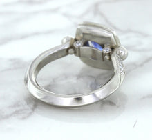 Load image into Gallery viewer, 1.56ct Oval Blue Sapphire Ring with Diamond Halo in Platinum