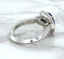 Load image into Gallery viewer, 1.56ct Oval Blue Sapphire Ring with Diamond Halo in Platinum