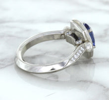 Load image into Gallery viewer, 1.56ct Oval Blue Sapphire Ring with Diamond Halo in Platinum