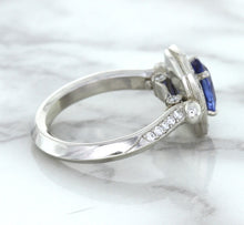 Load image into Gallery viewer, 1.56ct Oval Blue Sapphire Ring with Diamond Halo in Platinum