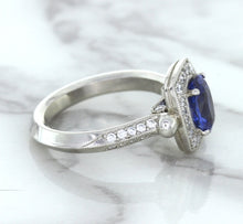 Load image into Gallery viewer, 1.56ct Oval Blue Sapphire Ring with Diamond Halo in Platinum