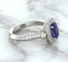 Load image into Gallery viewer, 1.56ct Oval Blue Sapphire Ring with Diamond Halo in Platinum