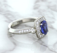 Load image into Gallery viewer, 1.56ct Oval Blue Sapphire Ring with Diamond Halo in Platinum