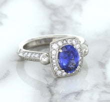 Load image into Gallery viewer, 1.56ct Oval Blue Sapphire Ring with Diamond Halo in Platinum