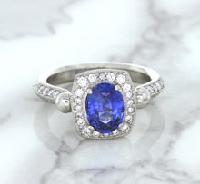 Load image into Gallery viewer, 1.56ct Oval Blue Sapphire Ring with Diamond Halo in Platinum