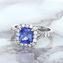 Load image into Gallery viewer, 1.74ct Radiant Blue Sapphire Ring with Diamond Halo in 18K White Gold