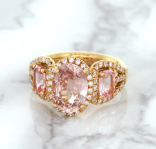 Load image into Gallery viewer, Three Stone Padparadscha Ring with Diamond Halo in 18K Rose Gold