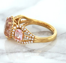 Load image into Gallery viewer, Three Stone Padparadscha Ring with Diamond Halo in 18K Rose Gold