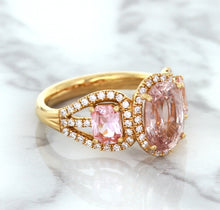 Load image into Gallery viewer, Three Stone Padparadscha Ring with Diamond Halo in 18K Rose Gold