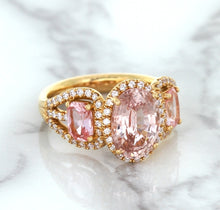 Load image into Gallery viewer, Three Stone Padparadscha Ring with Diamond Halo in 18K Rose Gold
