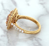 1.75ct. Cushion Padparadscha Ring with Sapphire and Diamond Halo in 18K Rose Gold