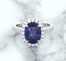 Load image into Gallery viewer, 3.68ct. Oval GIA Certified Blue Sapphire Ring with Diamond Halo in 18K White Gold