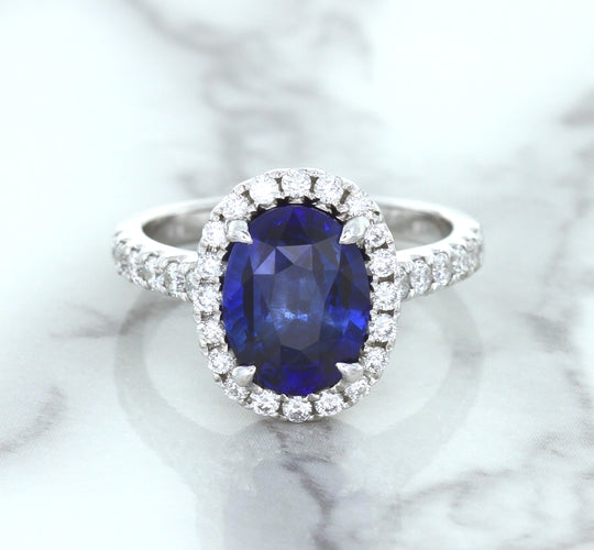 3.68ct. Oval GIA Certified Blue Sapphire Ring with Diamond Halo in 18K White Gold