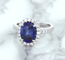 Load image into Gallery viewer, 3.68ct. Oval GIA Certified Blue Sapphire Ring with Diamond Halo in 18K White Gold