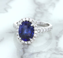 Load image into Gallery viewer, 3.68ct. Oval GIA Certified Blue Sapphire Ring with Diamond Halo in 18K White Gold