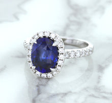 Load image into Gallery viewer, 3.68ct. Oval GIA Certified Blue Sapphire Ring with Diamond Halo in 18K White Gold