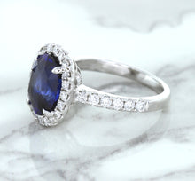 Load image into Gallery viewer, 3.68ct. Oval GIA Certified Blue Sapphire Ring with Diamond Halo in 18K White Gold