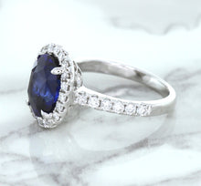 Load image into Gallery viewer, 3.68ct. Oval GIA Certified Blue Sapphire Ring with Diamond Halo in 18K White Gold