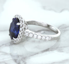 Load image into Gallery viewer, 3.68ct. Oval GIA Certified Blue Sapphire Ring with Diamond Halo in 18K White Gold