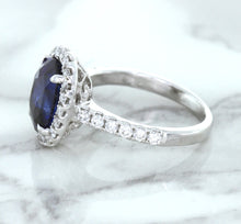 Load image into Gallery viewer, 3.68ct. Oval GIA Certified Blue Sapphire Ring with Diamond Halo in 18K White Gold
