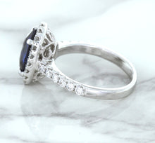 Load image into Gallery viewer, 3.68ct. Oval GIA Certified Blue Sapphire Ring with Diamond Halo in 18K White Gold