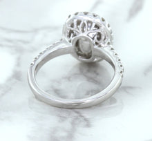 Load image into Gallery viewer, 3.68ct. Oval GIA Certified Blue Sapphire Ring with Diamond Halo in 18K White Gold