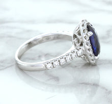 Load image into Gallery viewer, 3.68ct. Oval GIA Certified Blue Sapphire Ring with Diamond Halo in 18K White Gold