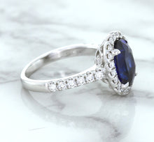 Load image into Gallery viewer, 3.68ct. Oval GIA Certified Blue Sapphire Ring with Diamond Halo in 18K White Gold