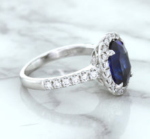 Load image into Gallery viewer, 3.68ct. Oval GIA Certified Blue Sapphire Ring with Diamond Halo in 18K White Gold