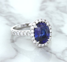 Load image into Gallery viewer, 3.68ct. Oval GIA Certified Blue Sapphire Ring with Diamond Halo in 18K White Gold
