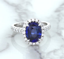 Load image into Gallery viewer, 3.68ct. Oval GIA Certified Blue Sapphire Ring with Diamond Halo in 18K White Gold