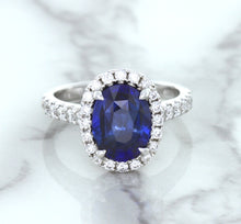 Load image into Gallery viewer, 3.68ct. Oval GIA Certified Blue Sapphire Ring with Diamond Halo in 18K White Gold