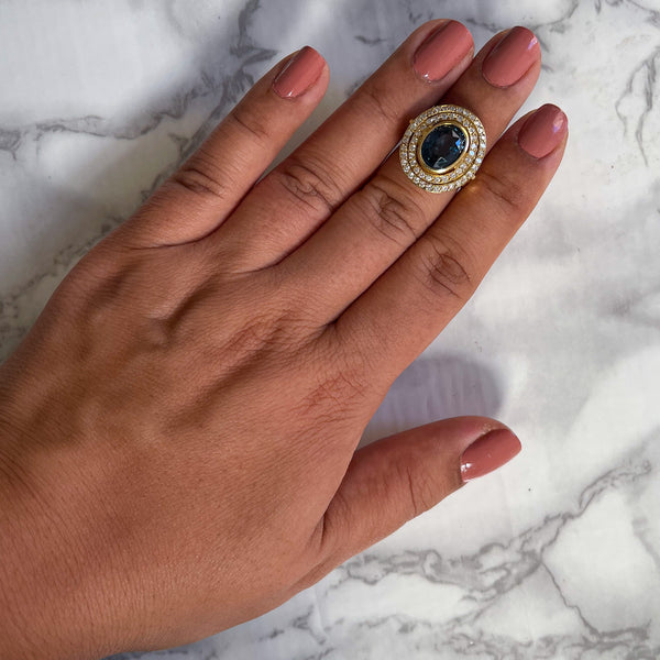 4.23ct Oval Blue Spinel Ring with Double Diamond Halo in 14K Yellow Gold