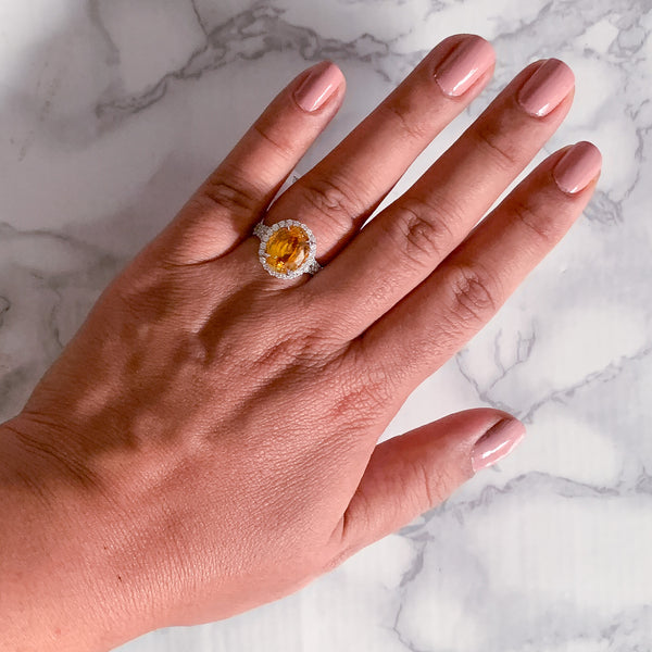 3.64ct Oval Yellow Sapphire Ring with Diamond Halo in 18K White Gold