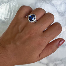 Load image into Gallery viewer, 4.79ct. Oval Blue Sapphire Ring with Diamond Halo in 18K White Gold