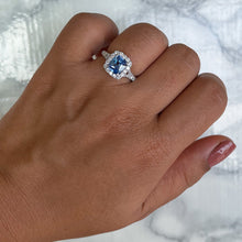 Load image into Gallery viewer, 1.74ct Radiant Blue Sapphire Ring with Diamond Halo in 18K White Gold