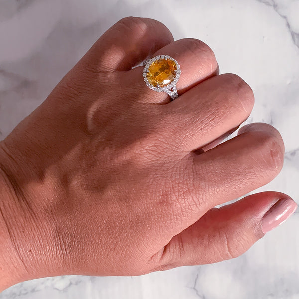 3.64ct Oval Yellow Sapphire Ring with Diamond Halo in 18K White Gold